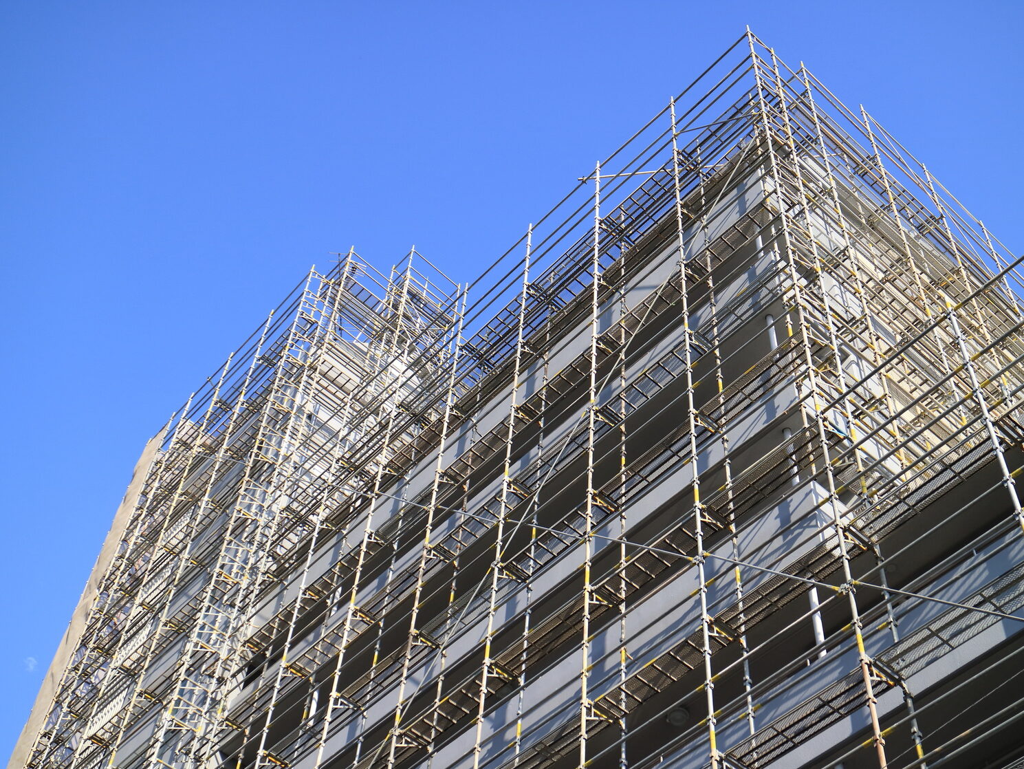 Concept image of a Calendar with a red push pin. Closeup shot of